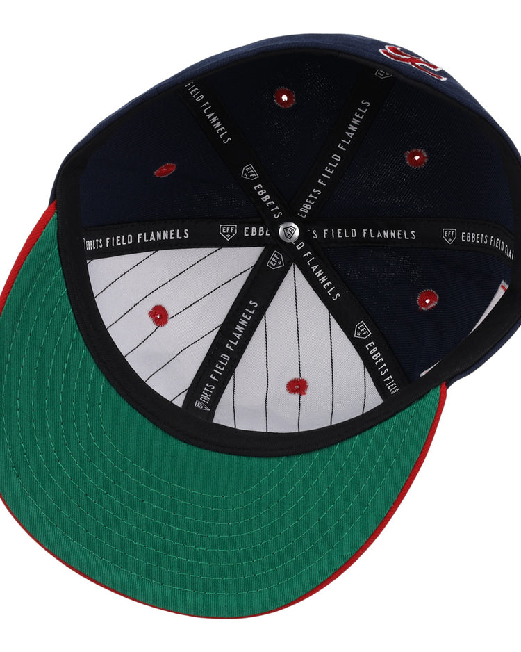 The Kansas City Katz EFF DNA Fitted Ballcap by EFF is a navy blue cap with a green underbrim, red stitching, pinstriped white lining, vintage-inspired fitted style, and branded internal band.