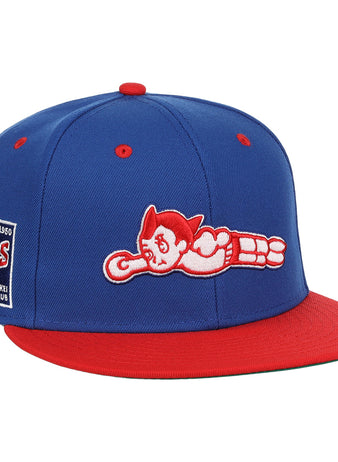 The EFF Sankei Atoms DNA Fitted Ballcap is a blue and red vintage cap with an embroidered Atom Boy flying on the front and a side patch that reads Atoms Baseball Club with the number 4500.