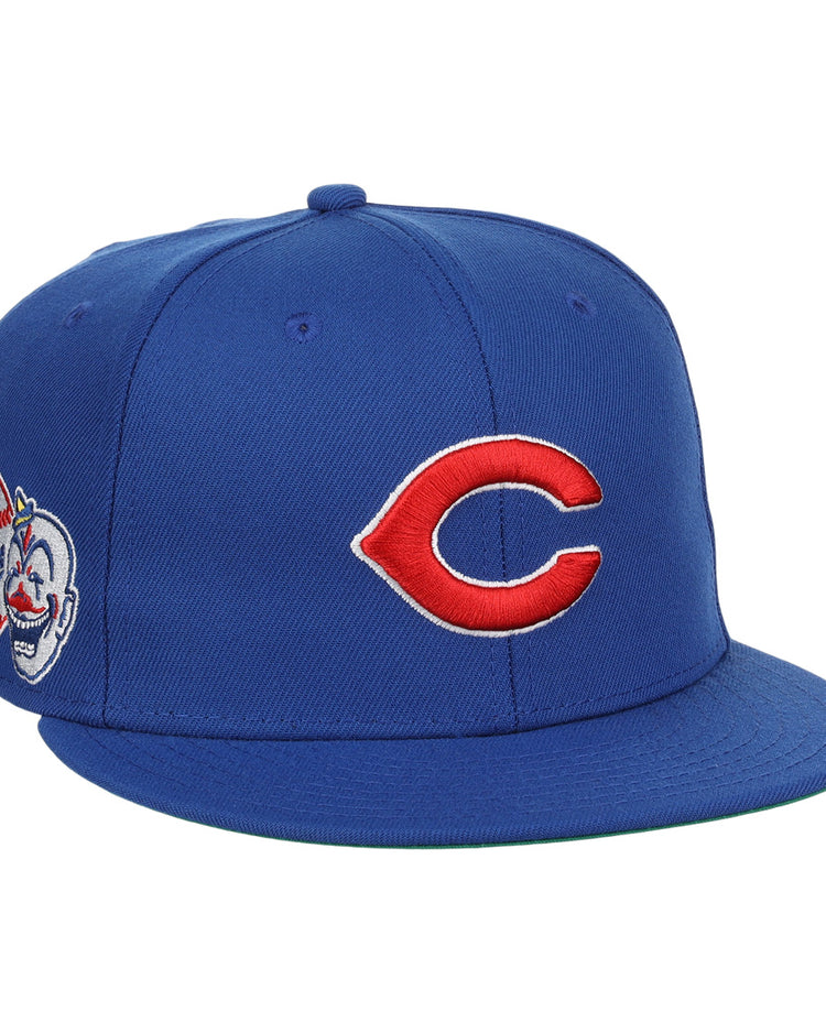 The EFF Indianapolis Clowns NLB Team Color Fitted Ballcap is a vintage-inspired blue cap with a red C front, an Indianapolis Clowns patch with baseballs and Cubs text on the left, honoring the Negro American League.