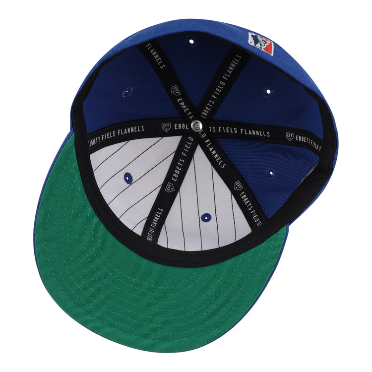 The EFF Indianapolis Clowns NLB Team Color Fitted Ballcap features a blue crown, green underbill, black sweatband, gray pinstriped lining, and EFF branding—paying tribute to the historic Indianapolis Clowns.