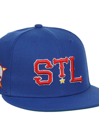 The EFF St. Louis Stars NLB Team Color Fitted Ballcap features bold red and white STL letters with a yellow star, plus a side patch with STL Stars outlined by a red star, inspired by Negro National League vintage caps.