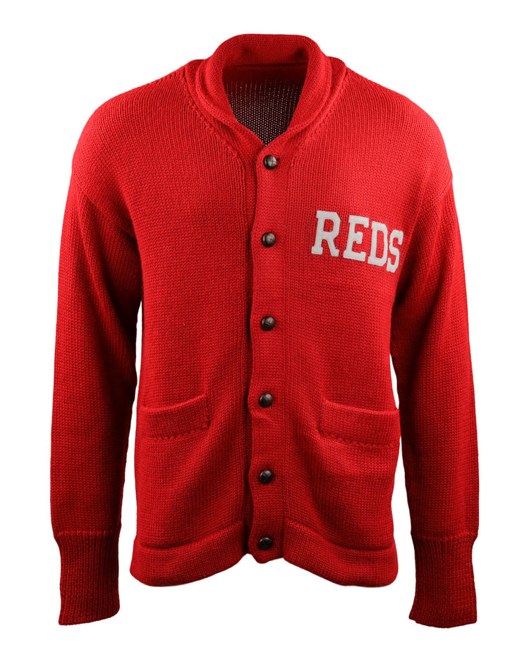 The EFF Cincinnati Reds 1919 Shawl Collar Sweater features a vintage red design with black buttons, two front pockets, and REDS in white letters on the left chest.