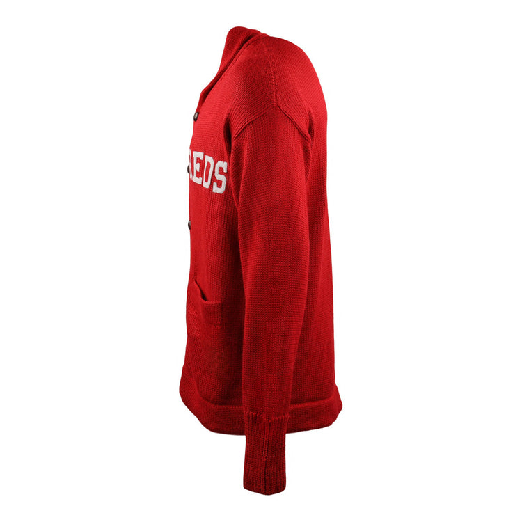 Side view of the EFF Cincinnati Reds 1919 Shawl Collar Sweater, a red button-up cardigan featuring front pockets and partially visible REDS lettering on the chest, inspired by vintage MLB style.