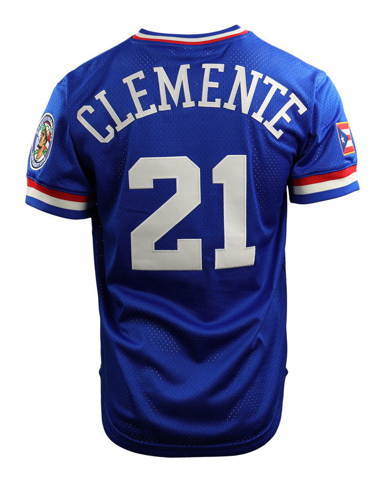 The EFF Roberto Clemente Santurce Cangrejeros Vintage Inspired NL Replica V-Neck Mesh Jersey in royal features white Clemente 21 on the back, a right sleeve patch, and a Puerto Rican flag patch on the left sleeve.