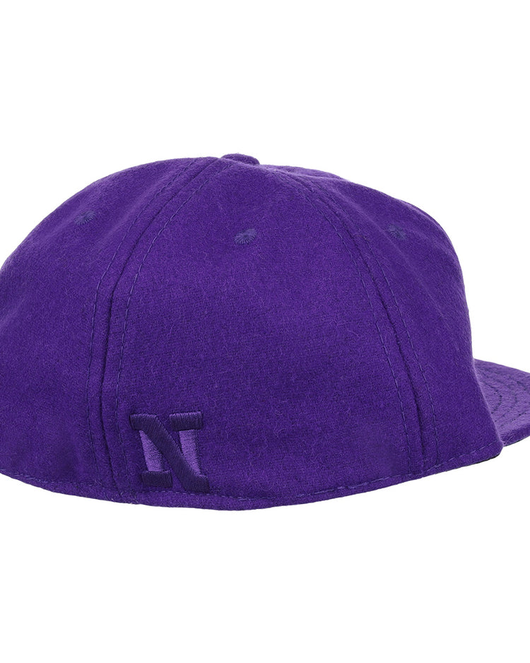 The EFF Northwestern University Mascot Vintage Ballcap features visible stitching, a raised N embroidered on the back, and a purple design honoring the schools iconic sports mascot. Photographed against a white background.