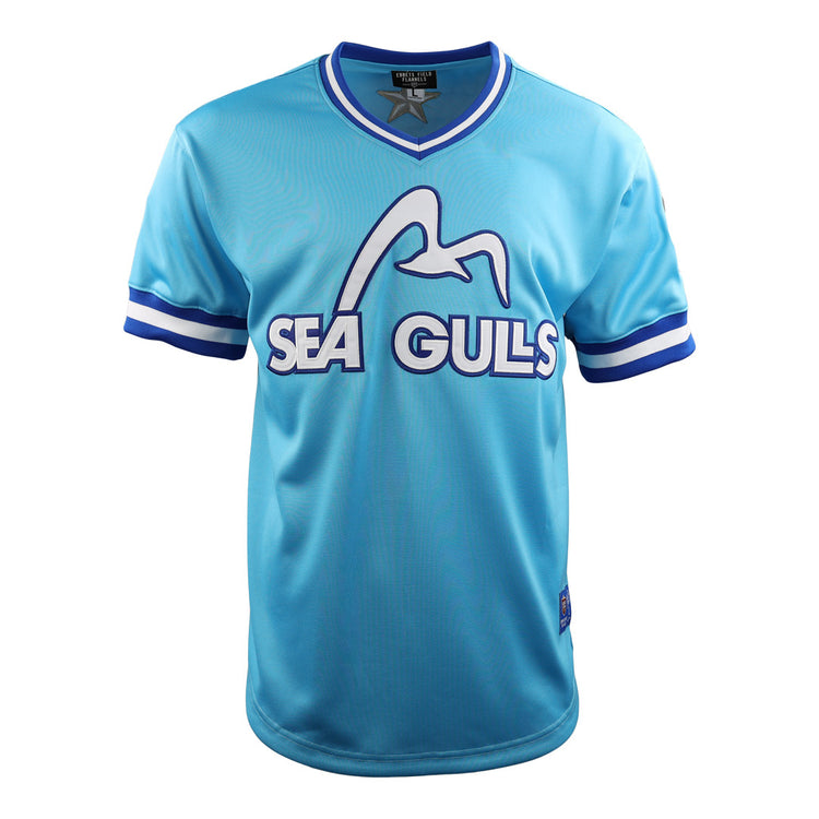 The EFF Corpus Christi Seagulls Lone Star Baseball Jersey features light blue fabric, white and blue striped sleeves, SEAGULLS text, and a seagull graphic—honoring the Gulf States League Champion Corpus Christi Seagulls.