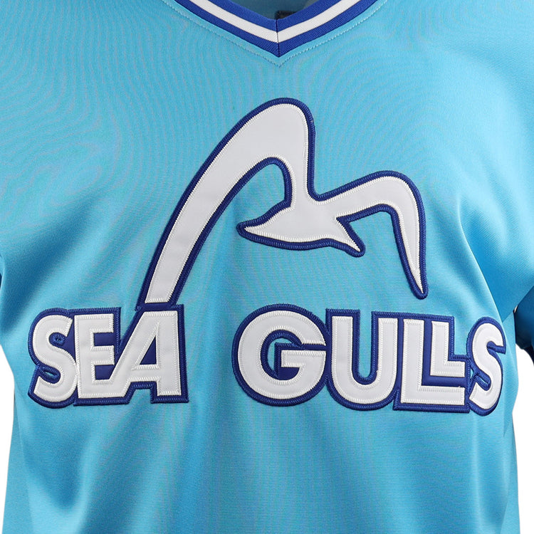 The EFF Corpus Christi Seagulls EFF Lone Star Baseball Jersey is light blue with SEA GULLS in large white outlined letters and a seagull graphic above, celebrating the Gulf States League champion team.
