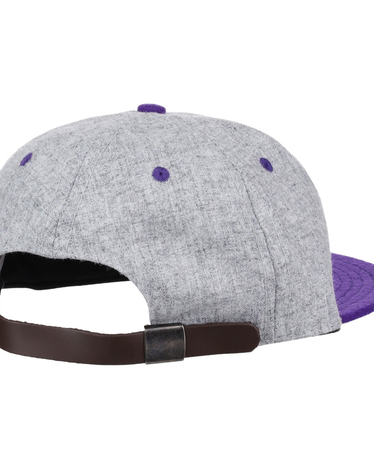 The EFF Northwestern University Mascot Vintage Ballcap in gray features a purple brim and button, brown adjustable strap with metal clasp, and is viewed from the back—a perfect vintage hat for showing off your Wildcat pride.