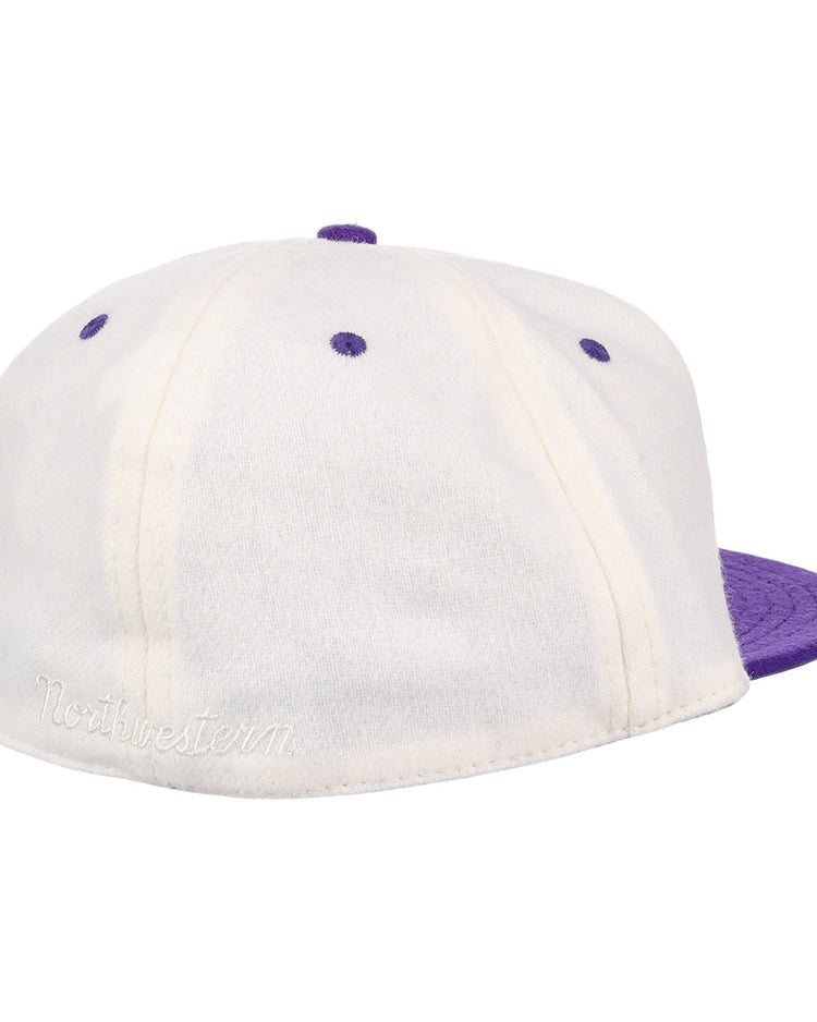 The EFF Northwestern University Vintage Ballcap is a white and purple hat with a purple brim, button, and stitched eyelets, plus Northwestern embroidered on the back—ideal for Wildcats collectors or EFF fans.
