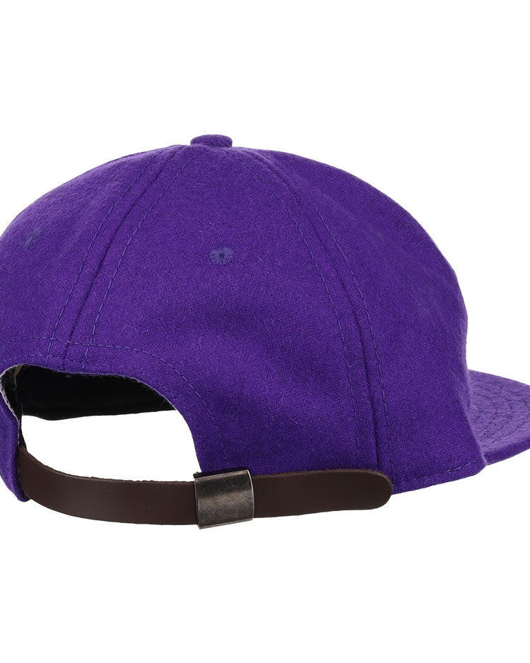 An EFF Northwestern University Mascot Vintage Ballcap in purple, shown from the back, features a brown adjustable strap with a metallic buckle.