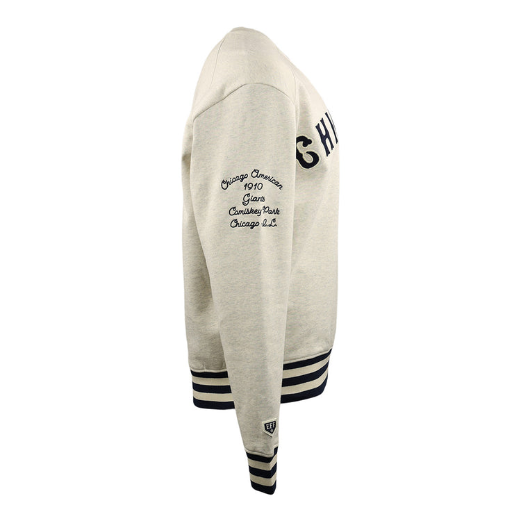 The EFF Chicago American Giants NLB Corduroy Crewneck features light gray corduroy, black striped cuffs and hem, CHICAGO on the chest, and an embroidered sleeve honoring the 1910 Negro Leagues team at Comiskey Park.