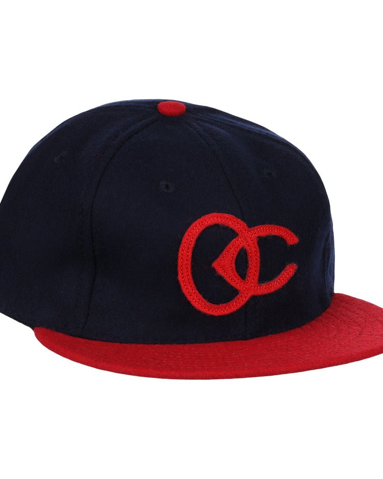 The EFF Oklahoma City Indians 1948 Vintage Ballcap features navy wool, a red brim and button, and interlocking red OC embroidery—classic Texas League style.