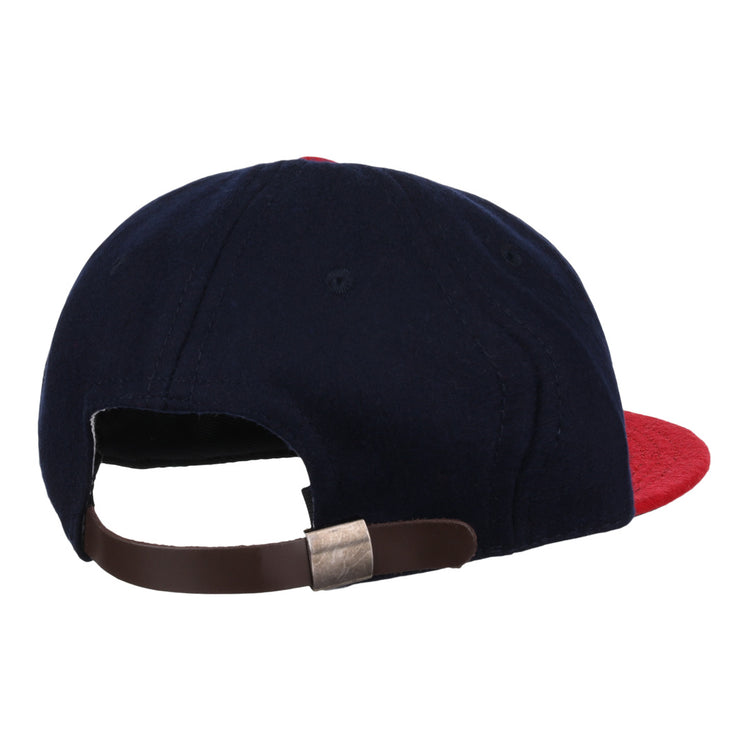 The EFF Oklahoma City Indians 1948 Vintage Ballcap is a navy wool cap with a red brim, brown adjustable strap, and metal clasp, shown from the back and inspired by classic Texas League style.