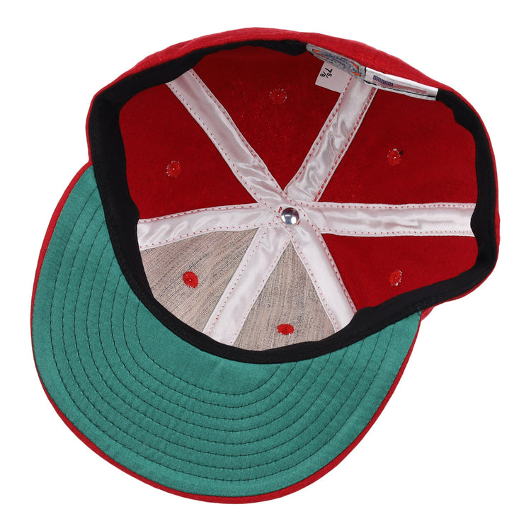 The EFF Greensboro Patriots 1922 Vintage Ballcap in red features a green underside brim, black trim, white internal stitching, and a silver center button.