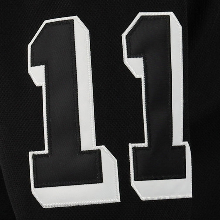 A large white-bordered black number 11 is shown on textured black fabric, likely from an EFF Violent Gentlemen x EFF Collection Hockey Jersey.