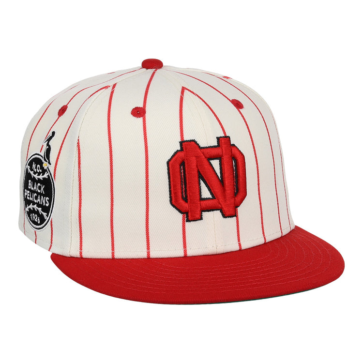 The EFF New Orleans Black Pelicans NLB Pinstripe Fitted Ballcap features red pinstripes, a solid red brim, a bold ND logo, and a black patch honoring the New Orleans Black Pelicans of the Negro Southern League.
