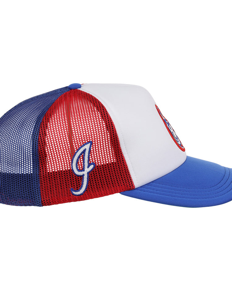 A side view of the EFF Indianapolis Indians EFF MiLB Vintage Foam Trucker snapback hat in blue, red, and white, featuring a blue mesh back, white front panel, red side, blue J embroidery, blue brim, and a circular front logo.