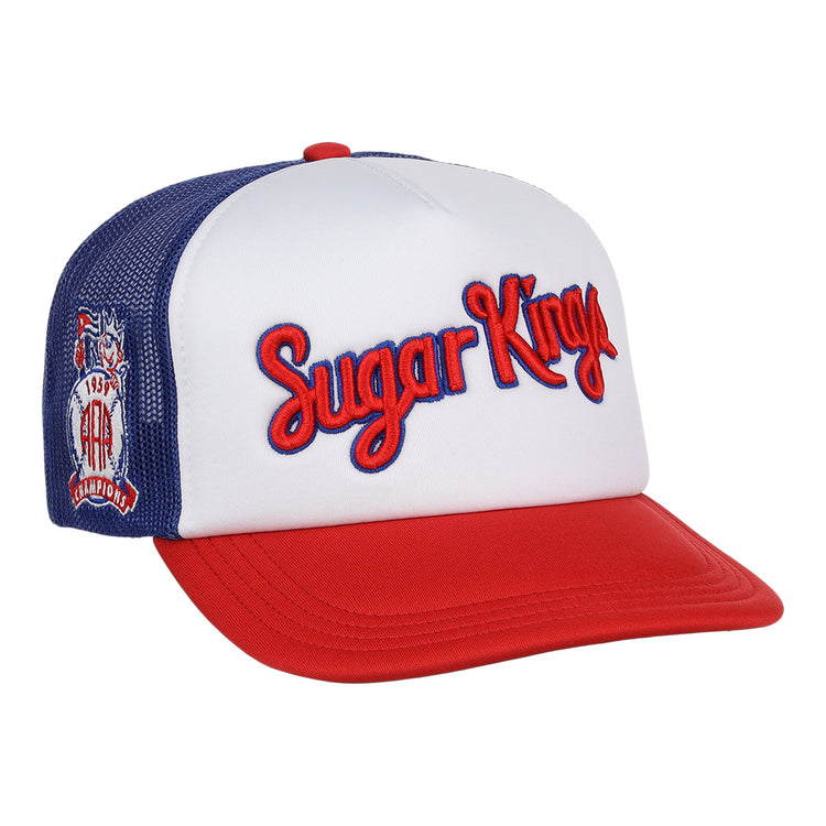 The EFF Havana Sugar Kings MiLB Vintage Foam Trucker cap features red, white, and blue colors, “Sugar Kings” embroidered in red on the front, and a patch honoring Havana baseball history with a crown, baseball, and 1954 on the side.