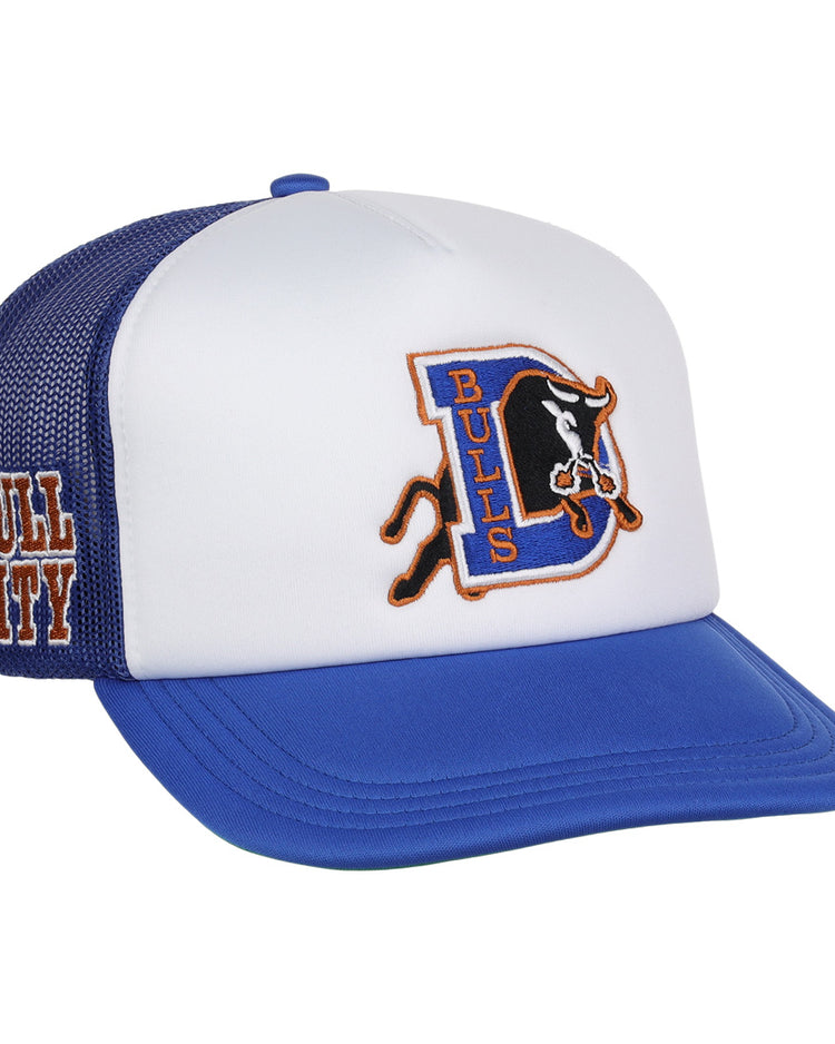The EFF Durham Bulls EFF MiLB Vintage Foam Trucker hat features a blue and white design, mesh back, the Durham Bulls logo on front, and “BULL CITY” in orange on the side—a must-have for vintage Minor League fans.