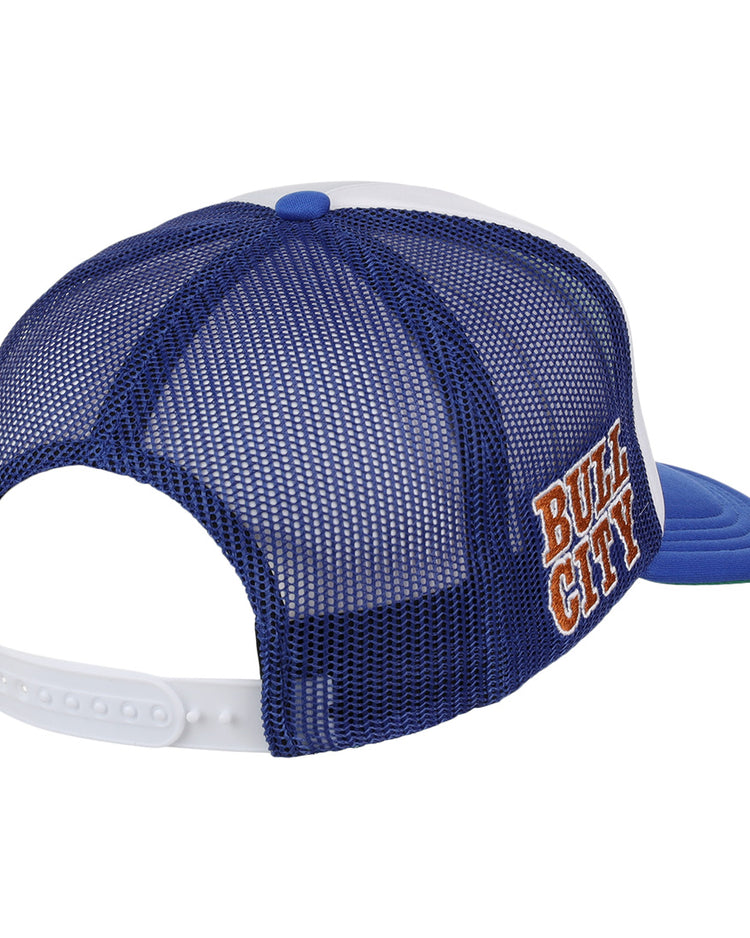 The EFF Durham Bulls EFF MiLB Vintage Foam Trucker features a blue mesh back with a white adjustable snapback strap, shown from the rear angle. BULL CITY is embroidered on the side in orange and white, evoking vintage minor league style.