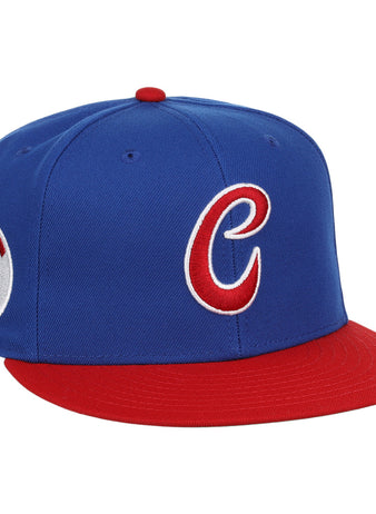 The Havana Sugar Kings EFF MiLB Vintage Snapback by Ebbets Field Flannels features a blue cap with red brim, a red and white C logo on the front, and a circular side patch—part of the Vintage Minor League collection.