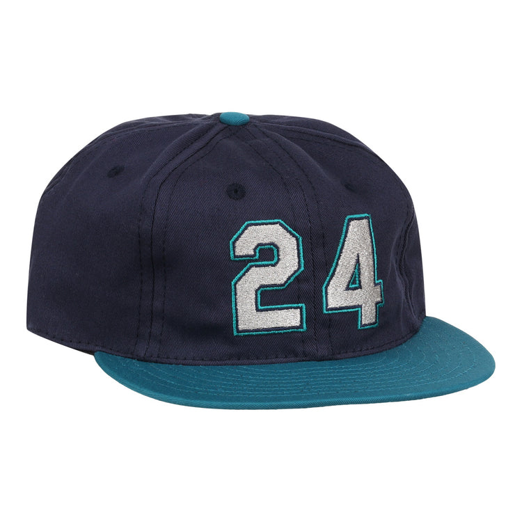 The Ebbets Field Flannels Ken Griffey Jr. 1995 Signature Series Ballcap is navy blue with a teal brim and button, and features the number 24 stitched in white and teal on the front.