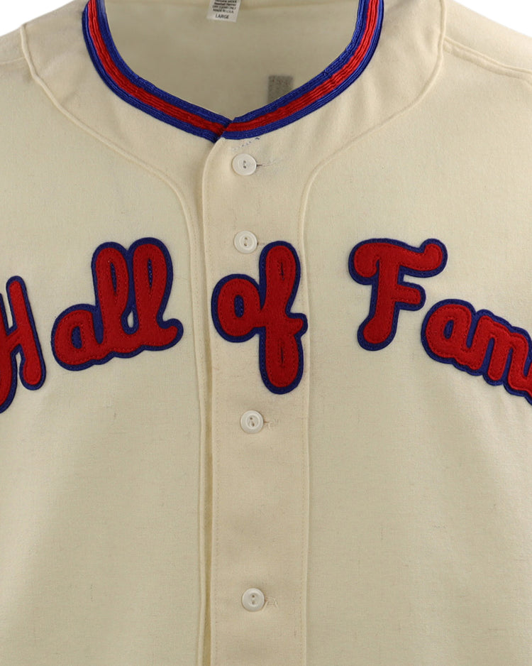 The EFF Al Kaline Hall of Fame Jersey is cream-colored with blue and red trim, featuring bold “Hall of Fame” script across the chest—a classic design inspired by Ebbets Field Flannels.