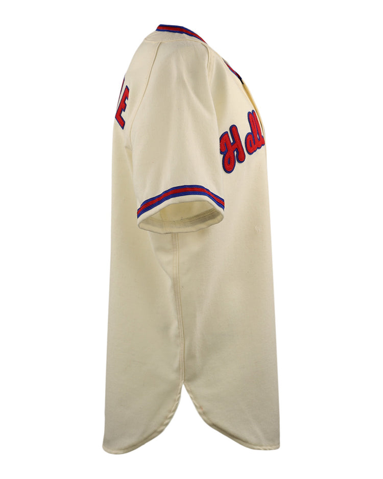 Side view of the cream Al Kaline Hall of Fame Jersey by EFF, with blue and red trim on sleeves and collar. Partial red HALLE text appears on chest and sleeve.