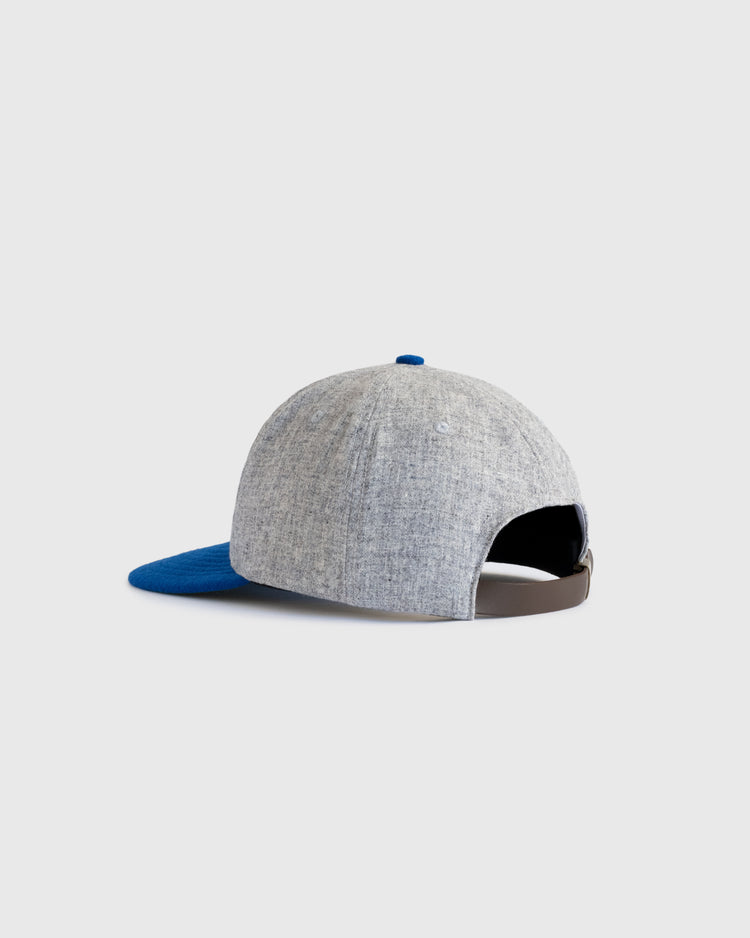 The EFF Montgomery Grey Sox 1916 Vintage Ballcap features a gray crown, blue brim and button, and a brown adjustable strap with buckle, showcased from the back against a plain light background.