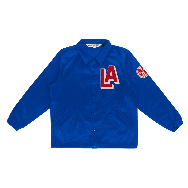 The EFF Los Angeles (PCL) Satin Windbreaker is royal blue with a button-up front, collar, bold red and white LA chest patch, and round red patch on the upper left sleeve—classic Pacific Coast League style.