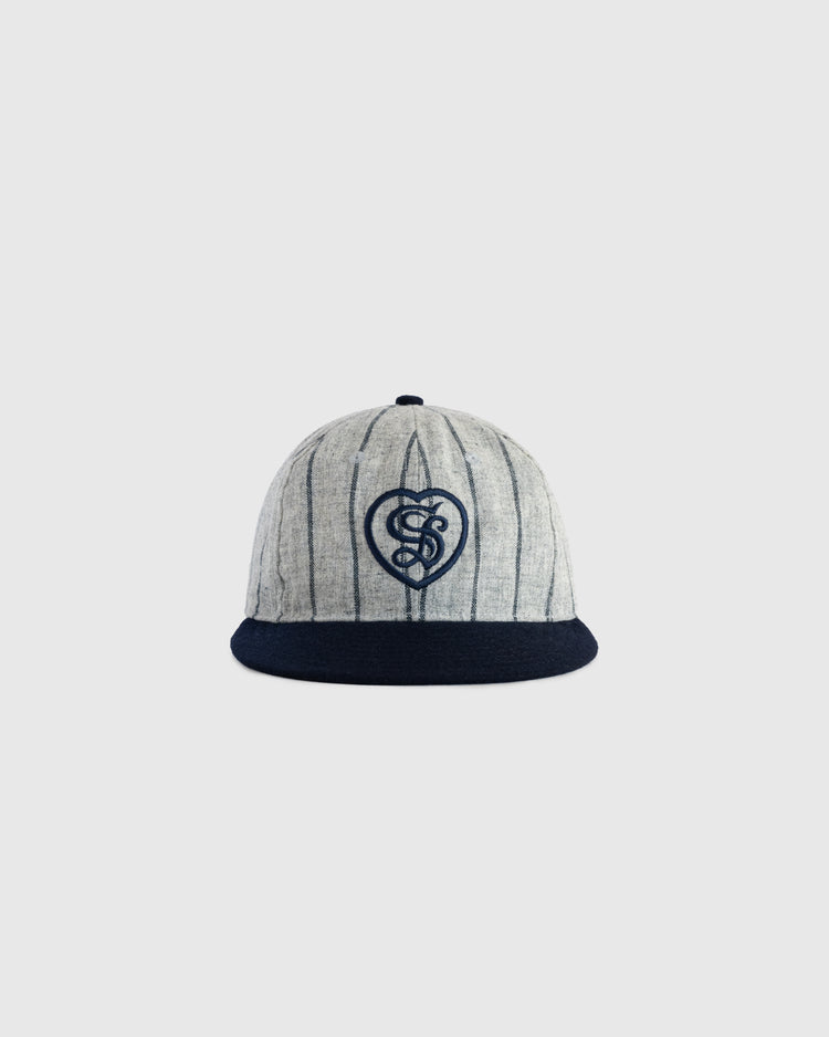The EFF Sacramento Senators Authentic Wool Ballcap features gray and navy pinstripes, a navy visor, and a stylized S in a heart on the front, displayed against a plain white background.
