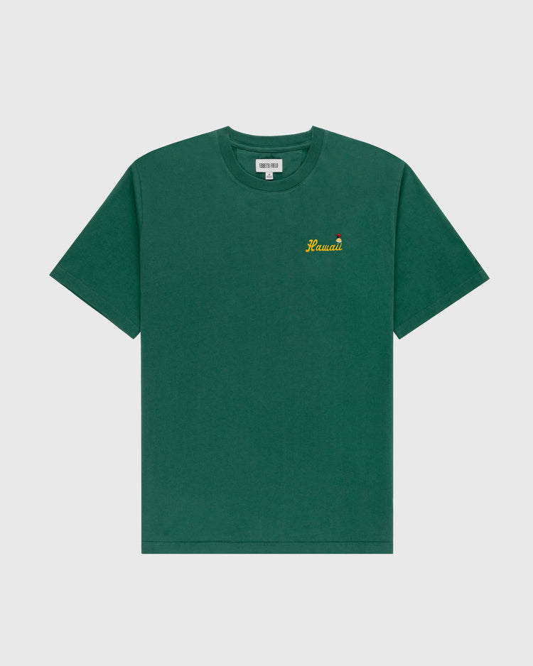 The Ebbets Field Hawaii Islanders (PCL) Embroidered ‘Hawaii’ Short Sleeve Tee is a plain green 200gsm cotton shirt with Hawaii and a small yellow-green pineapple embroidered on the left chest, shown flat on a white background.