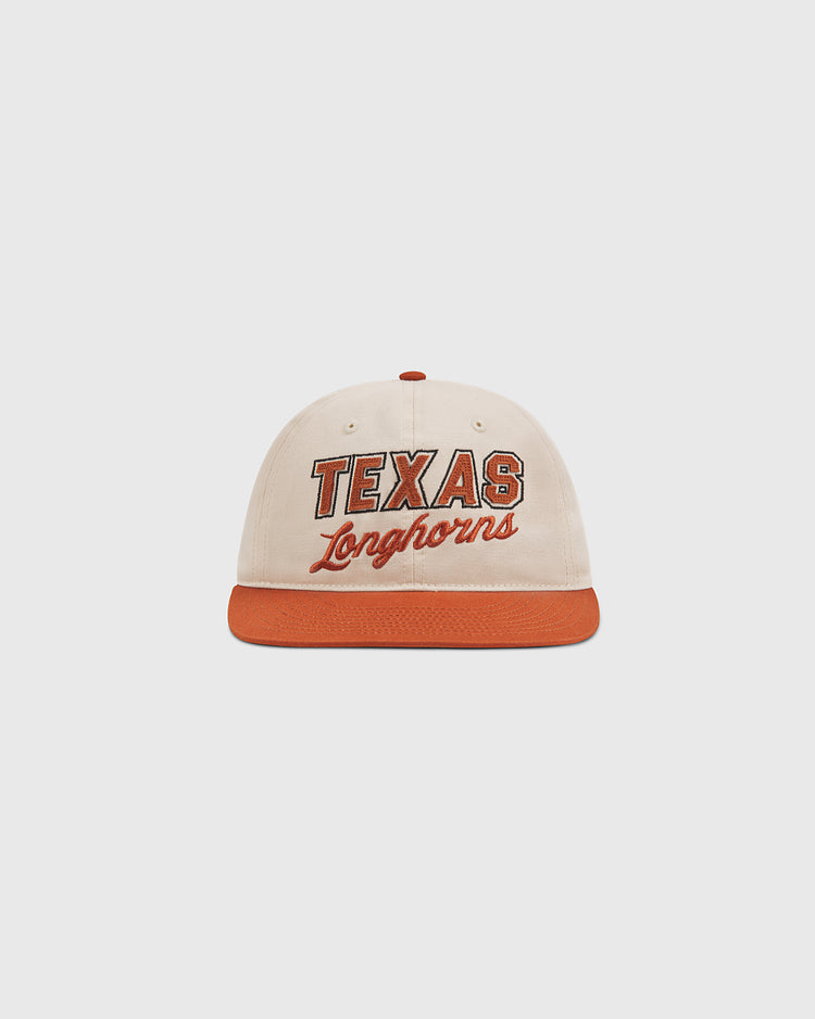 Show your University of Texas pride with the Ebbets Field University of Texas Longhorns Cotton Twill Ballcap, featuring a cream and orange design, bold TEXAS lettering, and Longhorns script on the front.