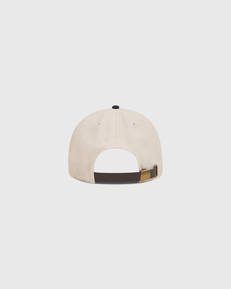 The Yale Chenille Logo Cotton Twill Ballcap by Ebbets Field is pictured from the back, highlighting its adjustable dark strap with a gold buckle against a plain white background—a timeless Ivy League style inspired by Yale University tradition.