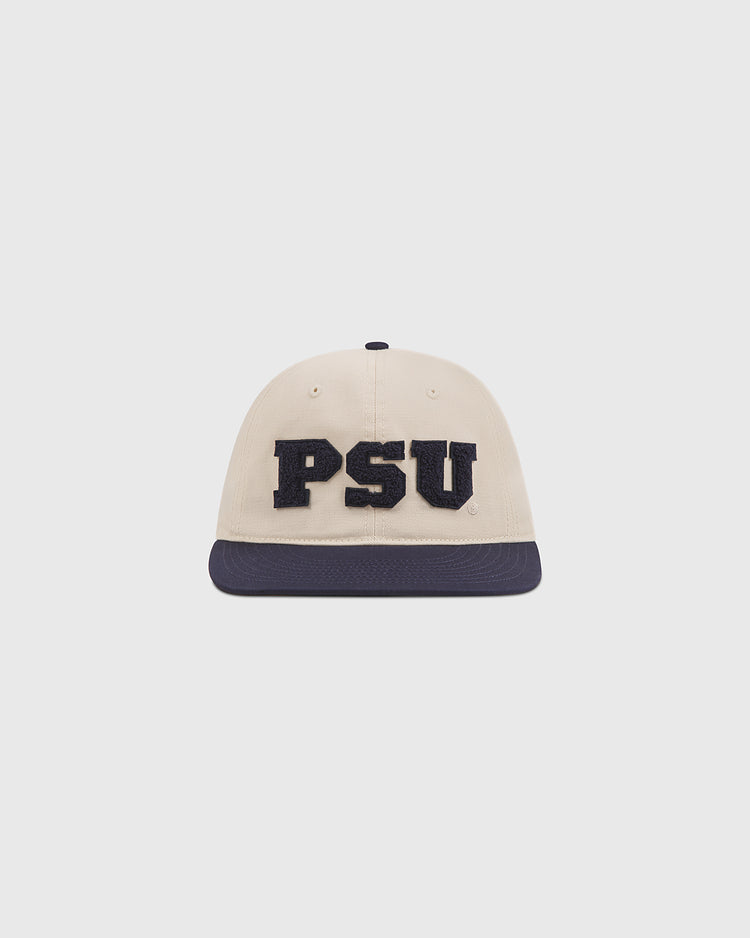 A Penn State Chenille Logo Cotton Twill Ballcap by Ebbets Field, featuring a beige crown with a dark brim and large black chenille “PSU” letters stitched on the front, made from durable cotton twill and shown against a plain white background.