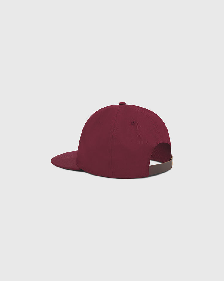 A Harvard University Chenille H Cotton Twill Ballcap by Ebbets Field, shown from the back in maroon, featuring an adjustable strap and flat brim, displayed on a plain light gray background.