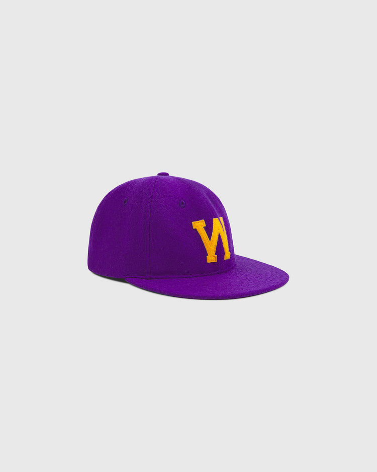The Ebbets Field University of Washington Authentic Wool Ball Cap is a purple wool cap with a bold yellow “W” embroidered on the front, displayed against a simple light background—an ideal choice for any Huskies baseball fan.