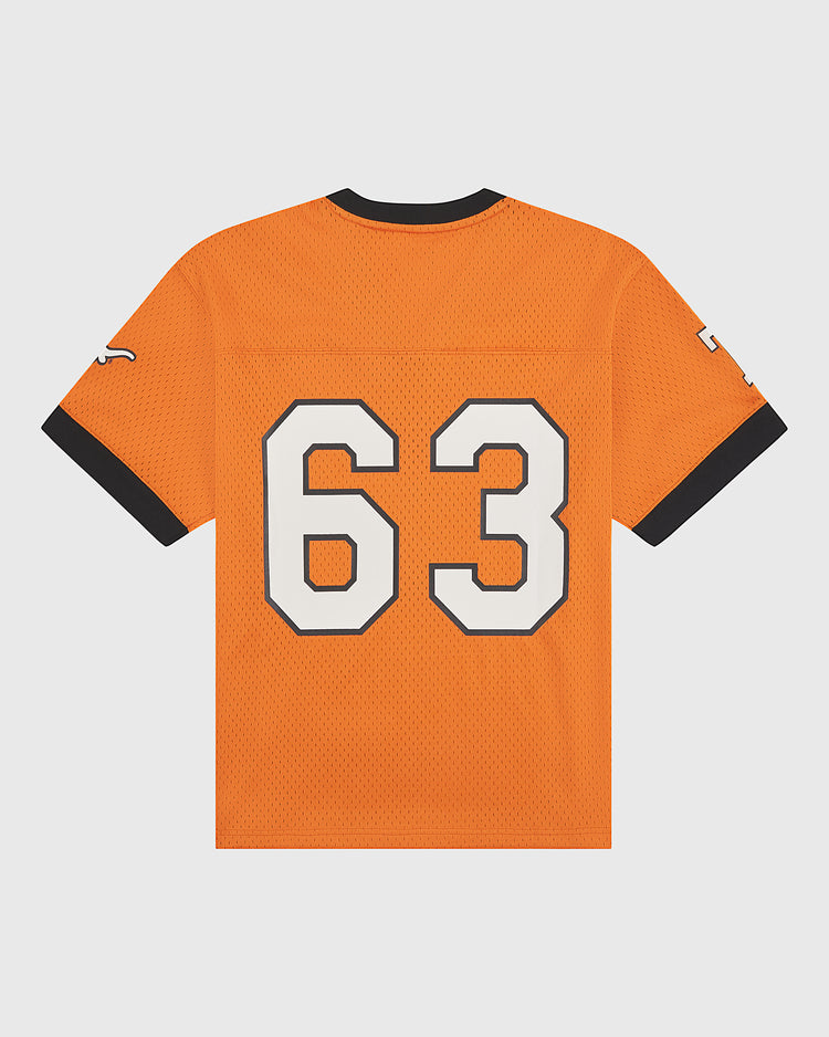 The Ebbets Field University of Texas Mesh Football Jersey is a vintage-inspired orange mesh jersey featuring a black collar and sleeve trim, with the number 63 boldly displayed in large white digits outlined in black on the back, capturing classic University of Texas style.
