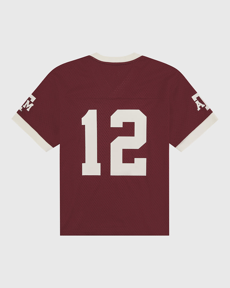 Ebbets Field Texas A&M Mesh Football Jersey in maroon, styled with a sharp white collar and sleeve cuffs, features bold white number 12 on the back and ATM logos on each sleeve. Displayed against a plain white background—an ideal piece for any Texas A&M Aggies fan or collector.