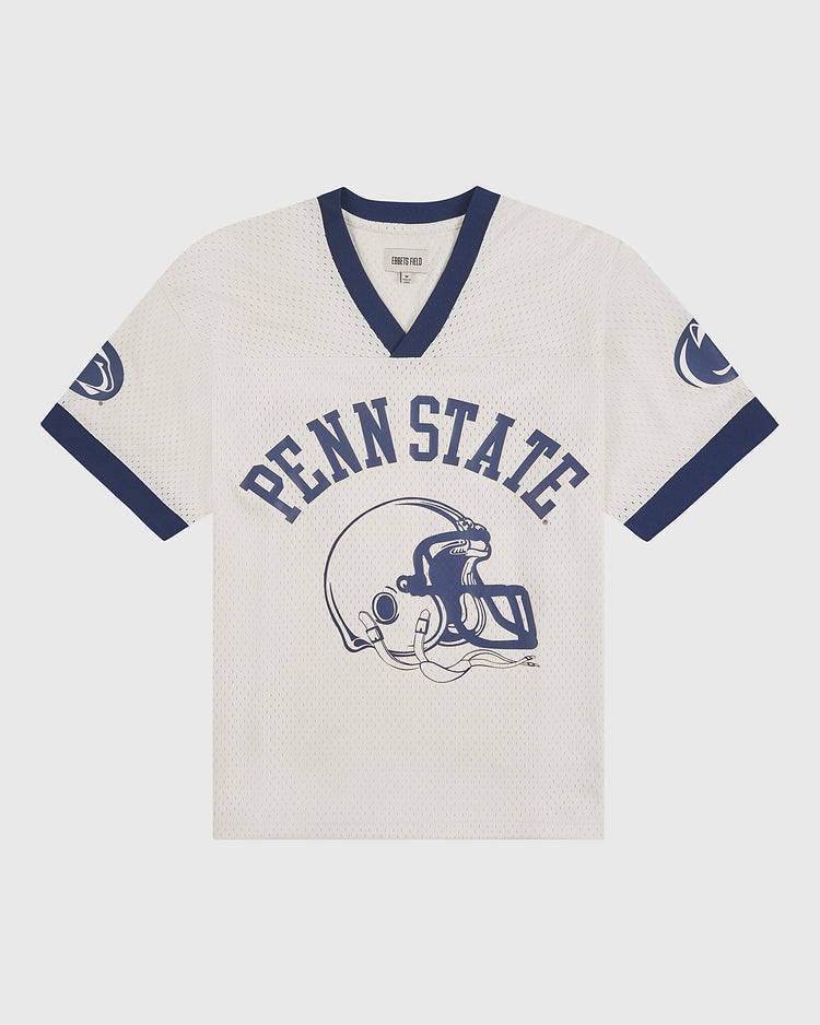 Show your team pride in classic style with the Penn State University Mesh Football Jersey by Ebbets Field. This white mesh jersey features blue trim, PENN STATE text, a football helmet graphic on the front, and blue logos on each sleeve—making it the perfect vintage-inspired piece for any Penn State fan.