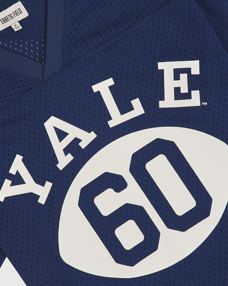 Close-up of the Ebbets Field Yale Mesh Football Jersey, displaying YALE in bold white letters and a large white oval with the number 60.