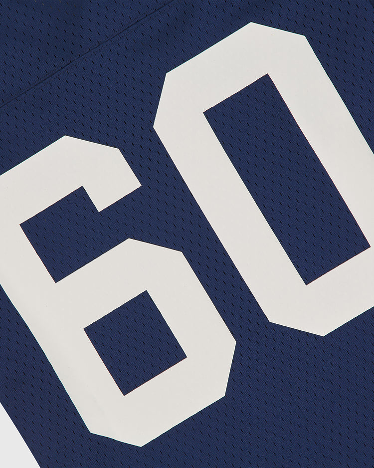 Close-up of an Ebbets Field Yale Mesh Football Jersey in blue, featuring a white number 60. The mesh texture adds to the vintage look of this Yale Bulldogs piece, giving it a genuine game-day feel.