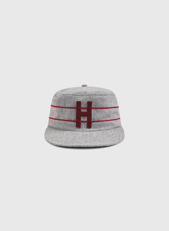 The Ebbets Field Harvard University 1899 Pillbox Wool Ballcap features a gray design with two thin horizontal maroon stripes and a large maroon letter H embroidered on the front, shown against a plain light background.