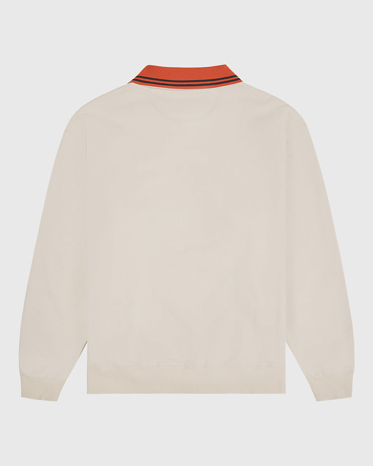 The University of Texas Collared Crewneck by Ebbets Field is a cream-colored long-sleeve shirt shown from the back, featuring an orange collar with dark stripes, as well as ribbed cuffs and a ribbed waistband.