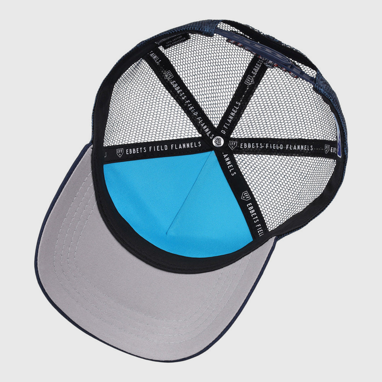 A view of the inside of an Amarillo Sod Poodles MiLB Trucker Ballcap by Ebbets Field, featuring black mesh panels, a light blue front panel, a wide gray brim, and black trim with white 