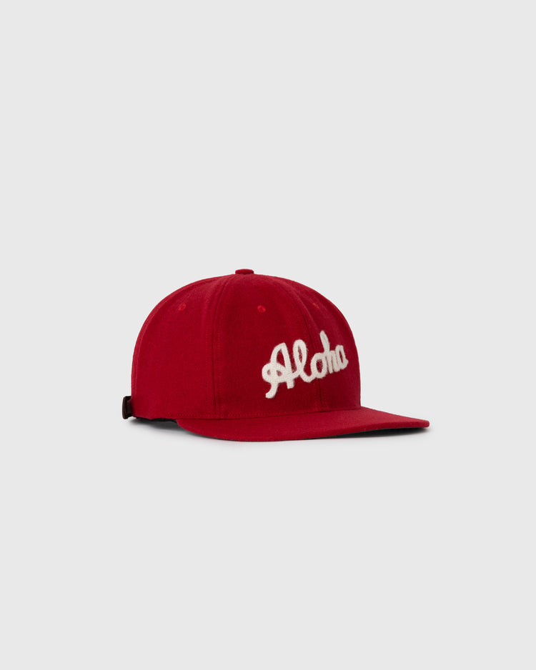 The EFF Aloha 100th Infantry 1942 Authentic Wool Ballcap features a red design with the white 1942 Aloha logo embroidered on the front, inspired by Japanese-American history and shown against a light gray background.