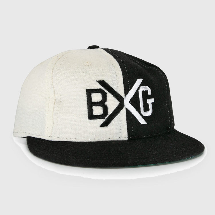 The EFF Bacharach Giants 1924 Vintage Ballcap is crafted from genuine wool and features black and white color blocks, a flat brim, and bold BXG embroidery on the front, inspired by the classic 1924 design.