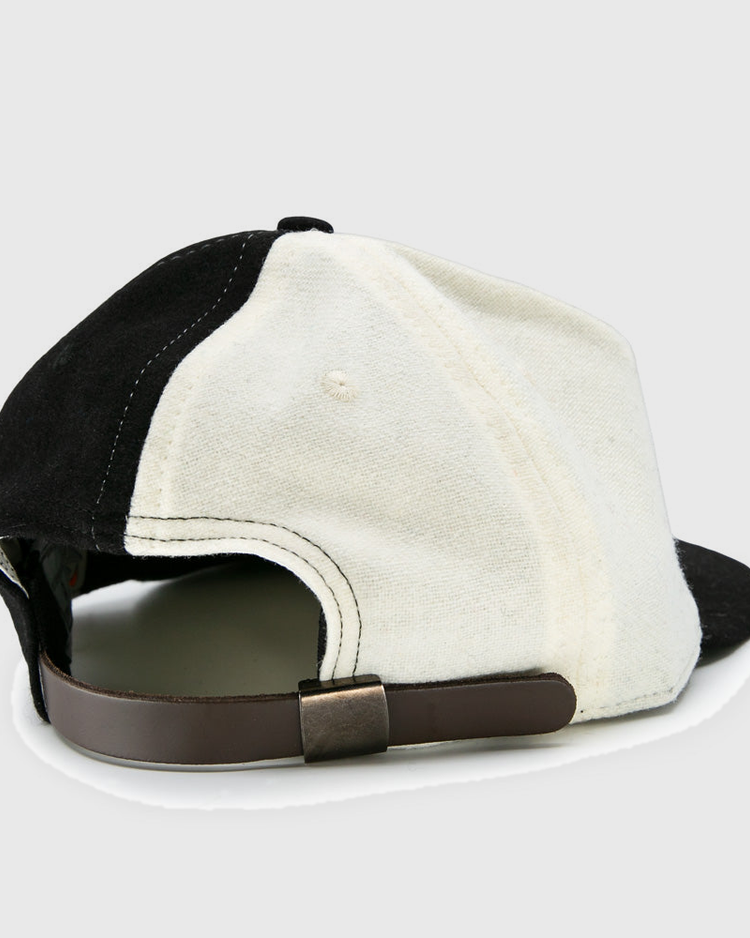 The EFF Bacharach Giants 1924 Vintage Ballcap is black and white, shown from the back with a brown adjustable strap, metal buckle, visible stitching, and classic styling.