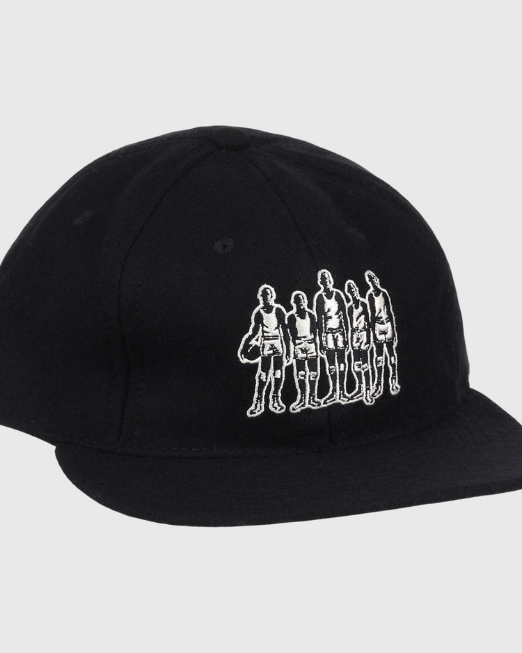 The Black Fives Wool Ballcap by Ebbets Field Flannels is a black vintage-inspired baseball cap featuring a white outline graphic of five people standing in a row on the front, celebrating the legacy of the Black Fives.