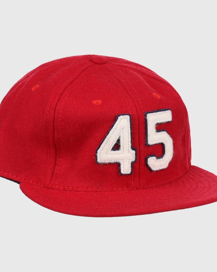 The Bob Gibson Signature Series Ballcap by Ebbets Field Flannels is a red flat-brim cap inspired by Gibson, featuring the number 45 in white with a black outline on the front.
